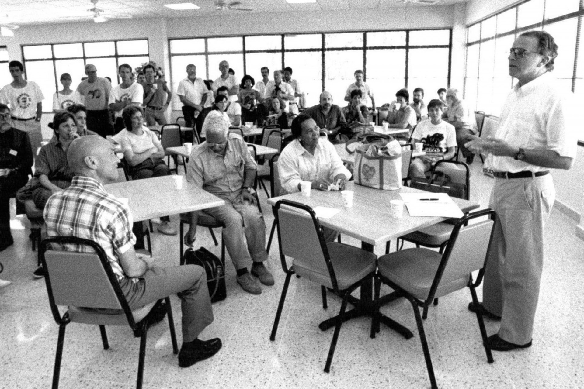 Ira Rubinoff, right, speaks in the dining room at Barro Colorado Island