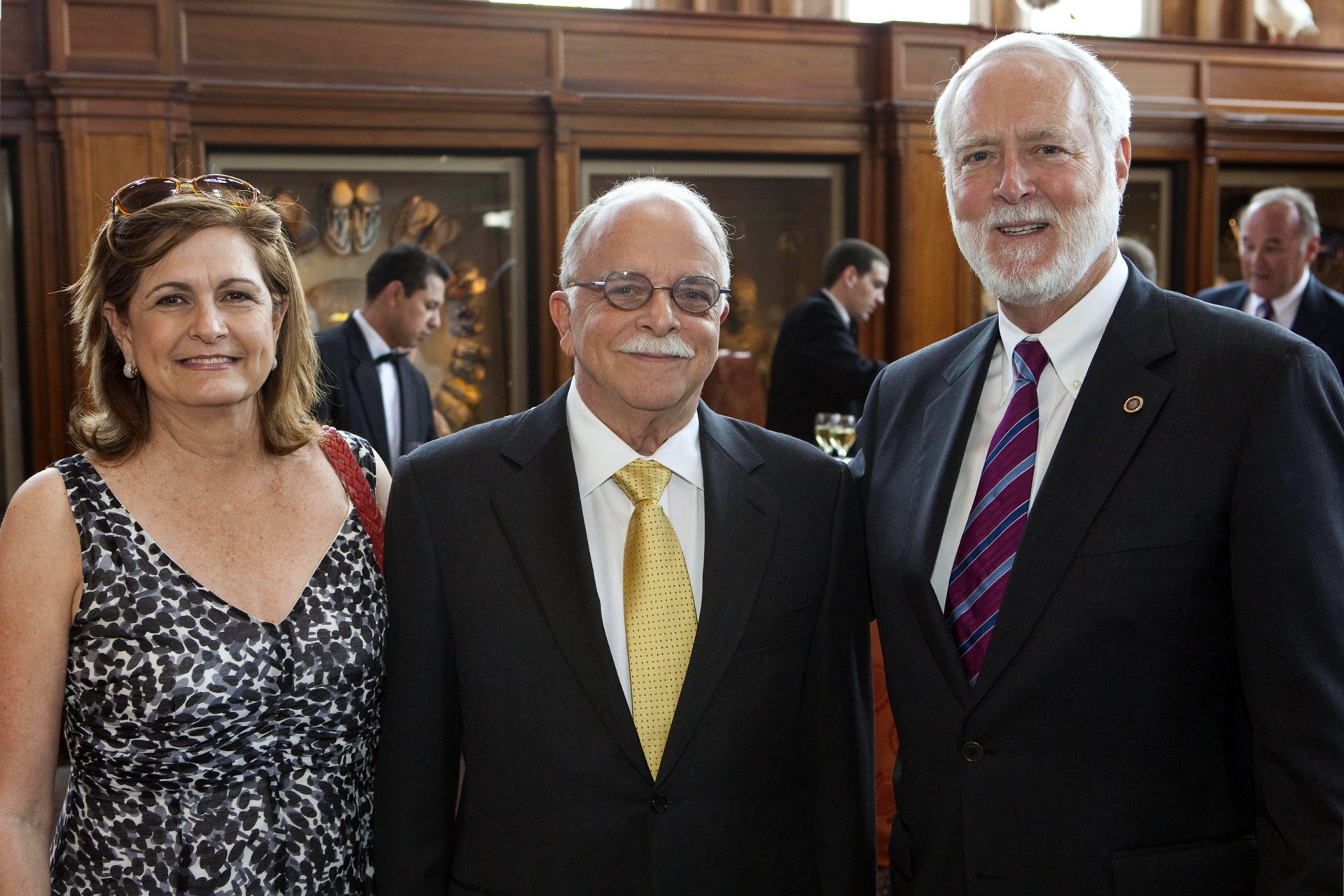 Ira Rubinoff, center, with his wife Anabella and Smithsonian Secretary Wayne Clough
