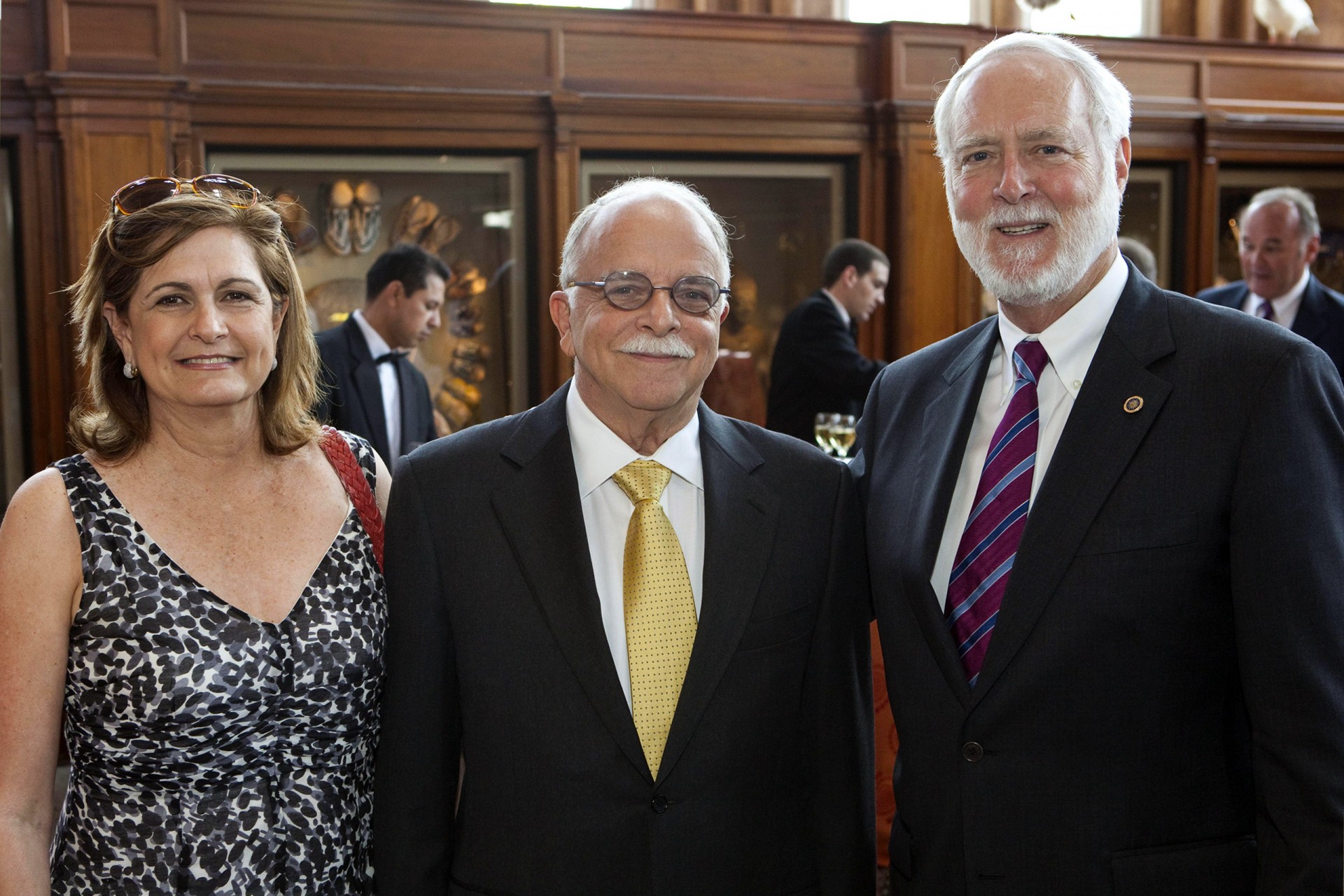 Ira Rubinoff, center, with his wife Anabella and Smithsonian Secretary Wayne Clough